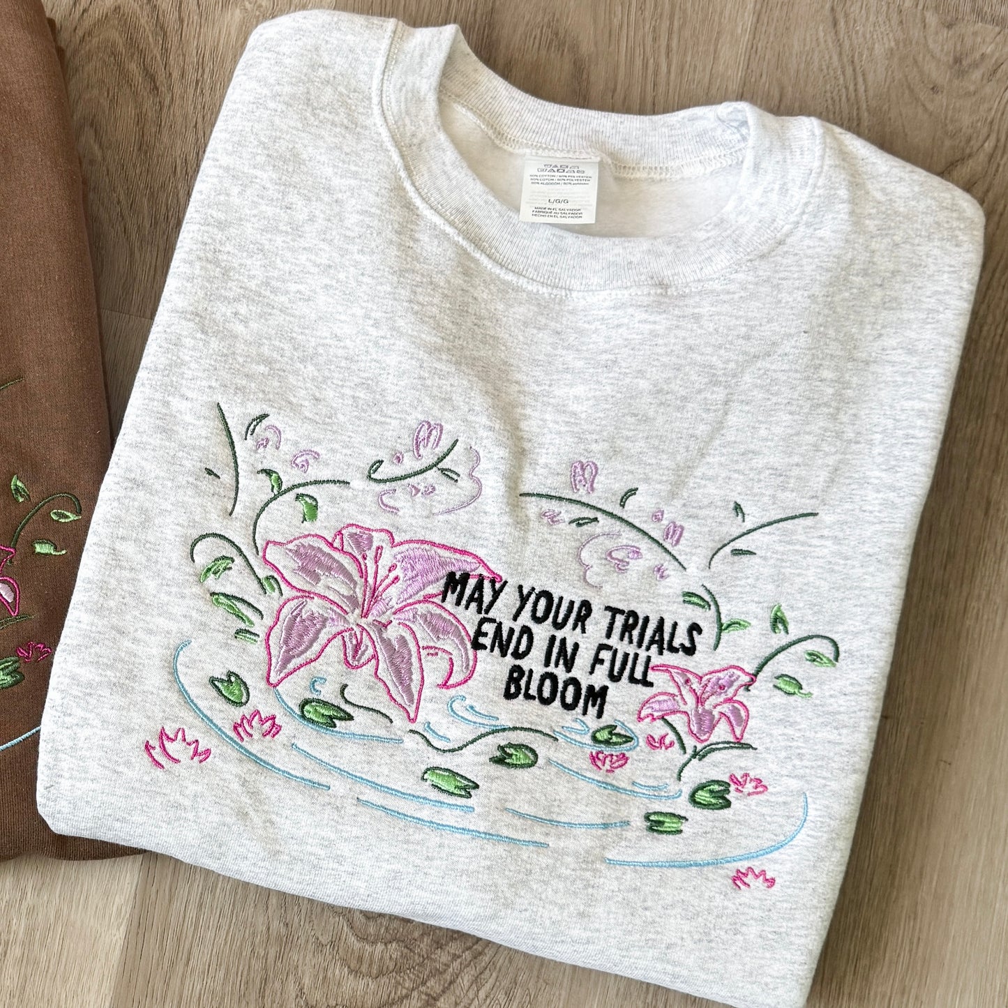 May Your Trials End In Full Bloom Embroidered Sweathsirt